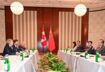 加拿大外长乔利与中国外长王毅会面,加拿大侨民期待加中关系改善