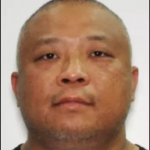 涉嫌谋杀地产经纪人梅育英的万锦男子胡志雄被全国通缉